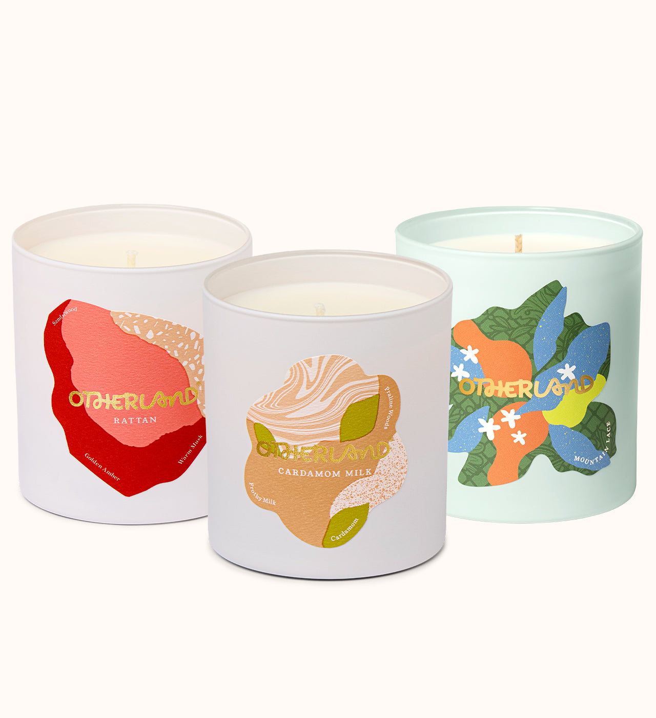 Three candles with colorful labels on a white background - View 0