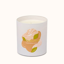 Cardamom milk candle in a white container with a label on a white background