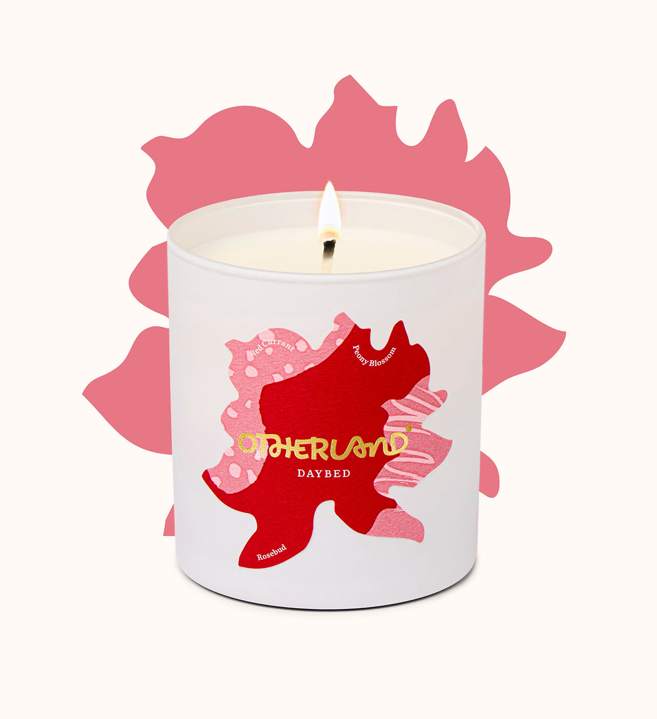 Candle with a red and pink design on a white background
