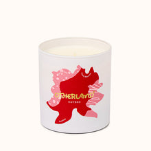 Daybed candle with a red and pink design on a white background