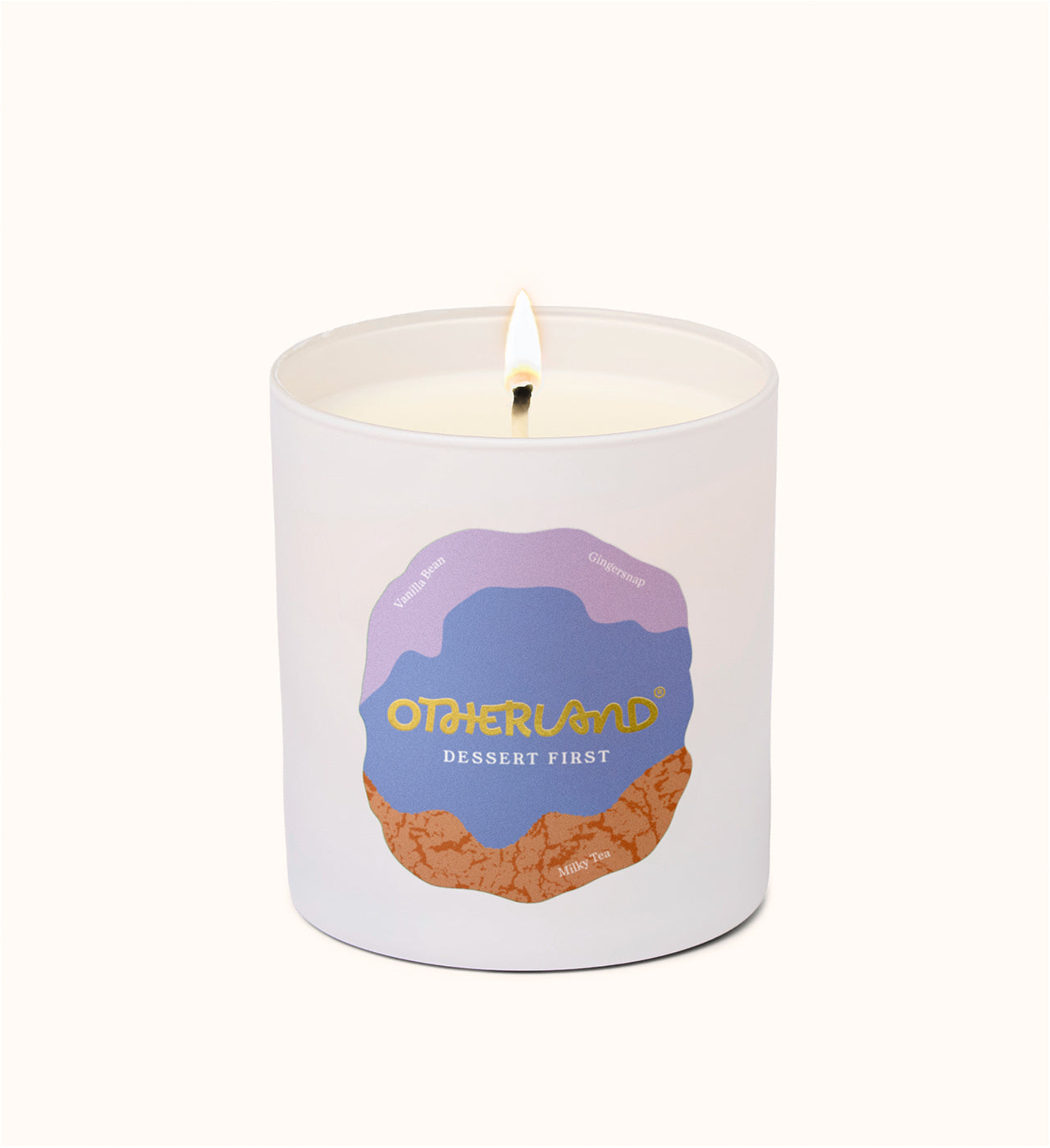 Candle with 'Otherland' branding on a white background