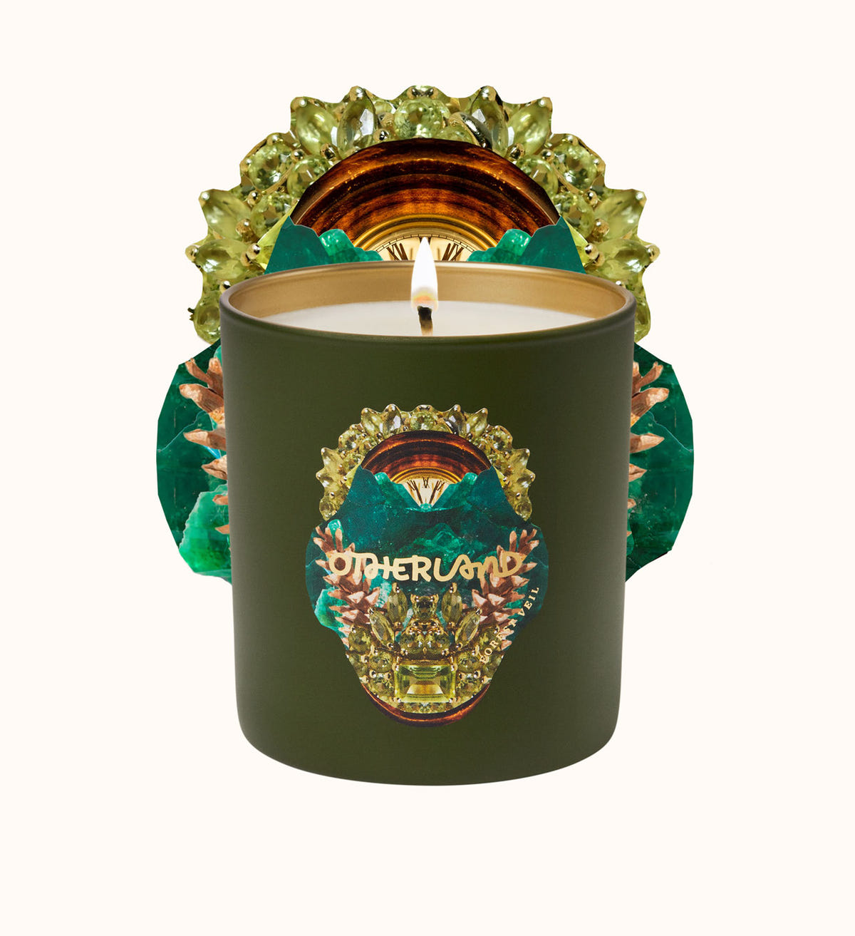 Green candle featuring 'Otherland' branding on a white background