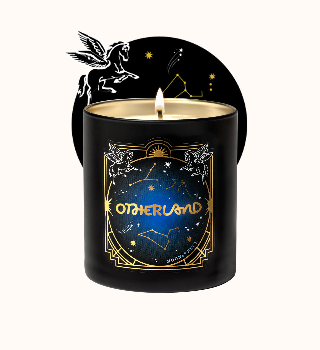 Black candle with 'Otherland' branding and celestial designs on a white background