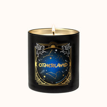 Black candle with 'Otherland' branding and celestial design on a white background