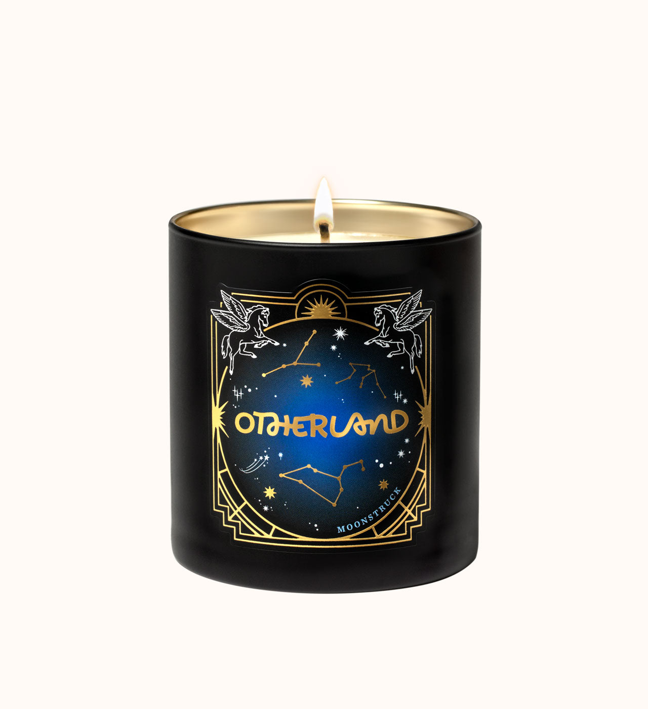Black candle with 'Otherland' branding and celestial design on a white background