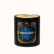 Black candle with gold accents and 'Otherland' branding on a white background