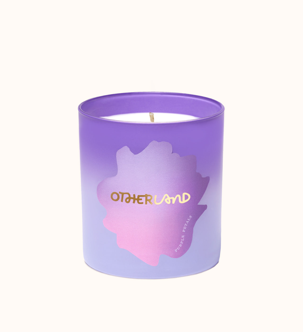 Purple Petals candle in a purple container with 'Otherland' branding on a white background