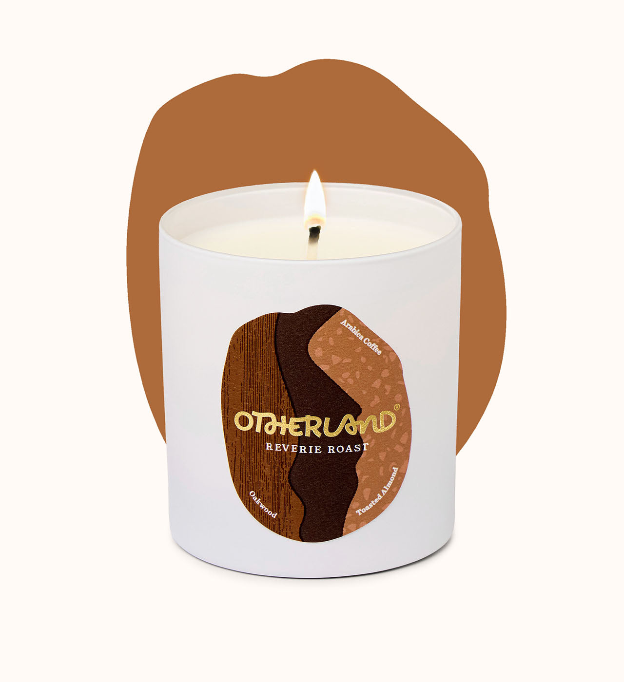 Reverie Roast candle with 'Otherland' branding on a white background