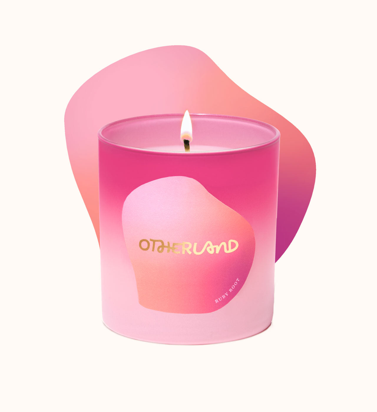 Pink candle with a gradient design and 'Otherland' branding on a white background
