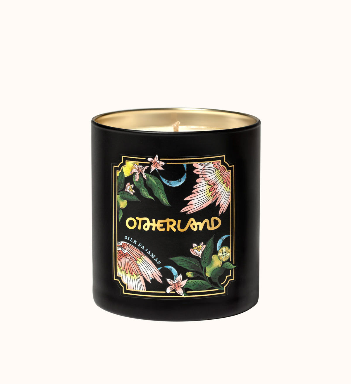 Black candle with floral design and 'Otherland' branding on a white background