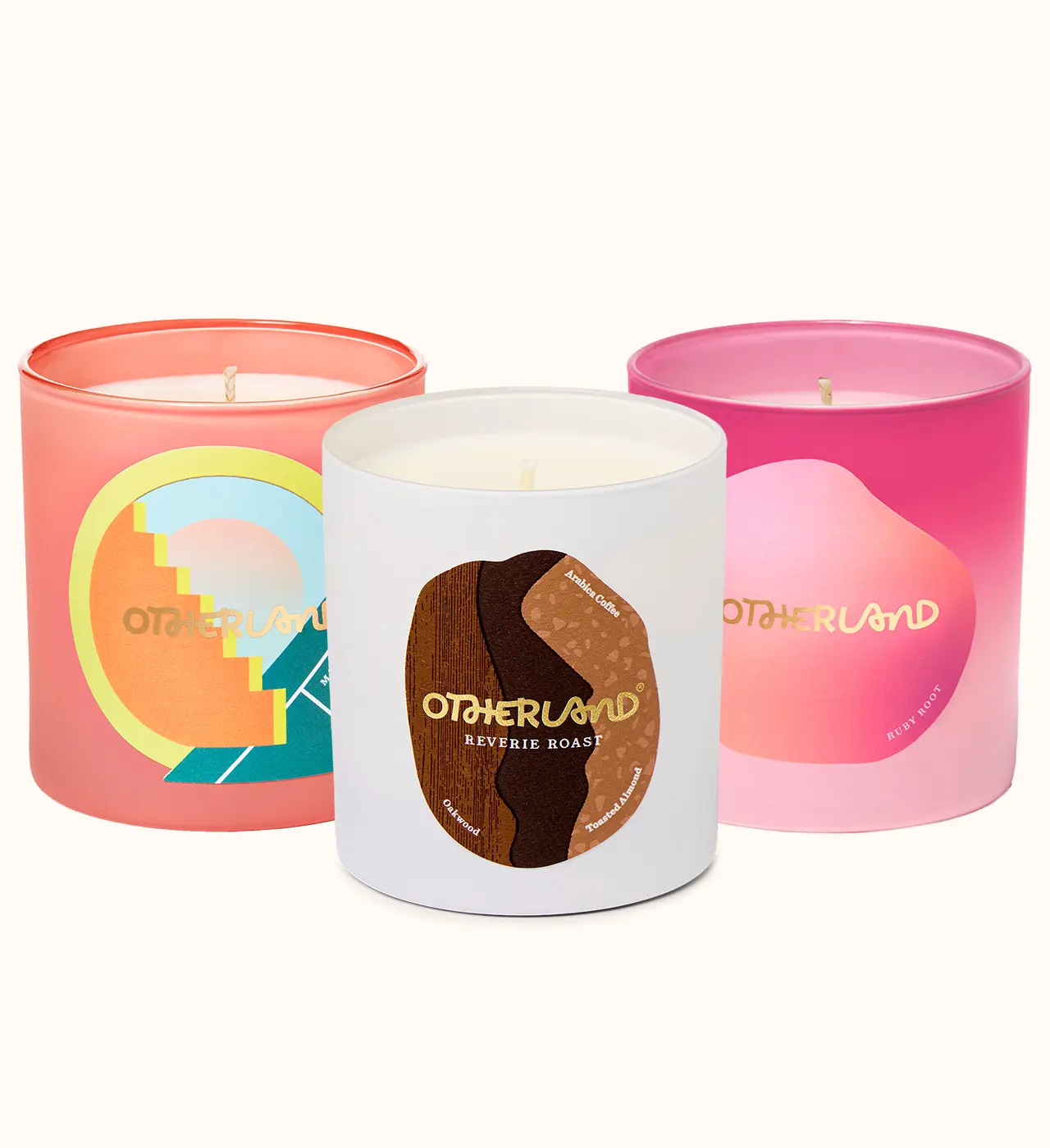 Three candles with colorful labels on a white background